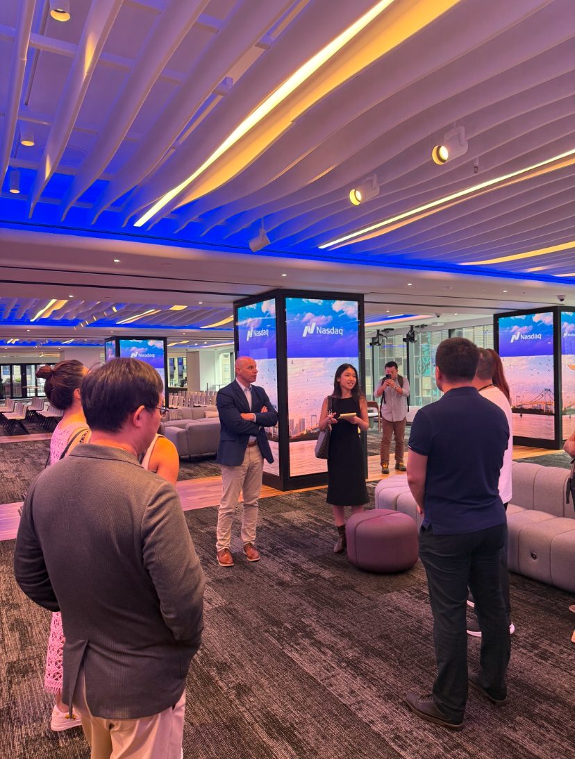 Business visitors in the Nasdaq event space