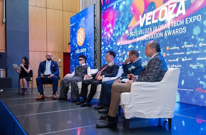 Panel discussion on stage at the VELOZA Global Tech Expo